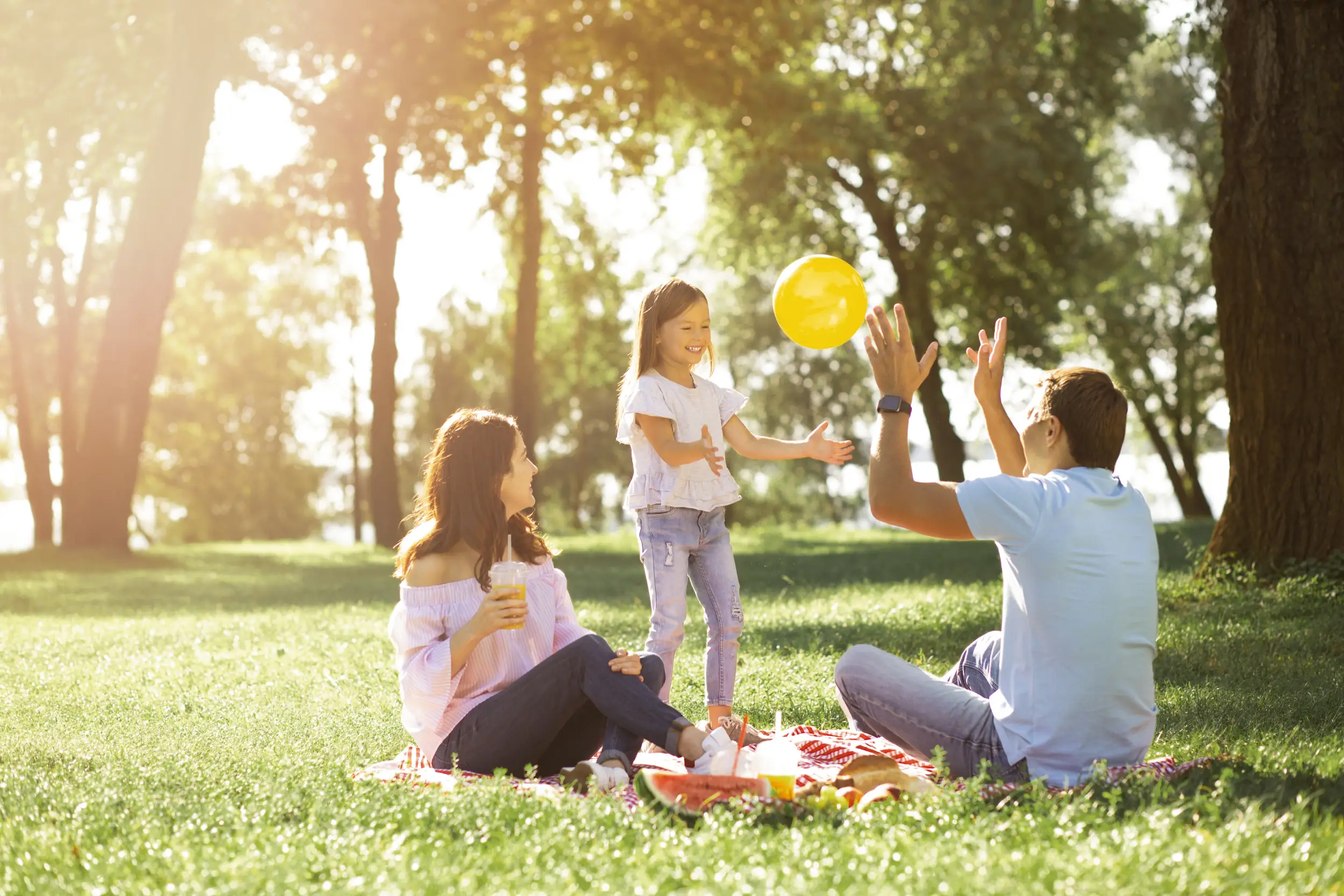 family playing in park